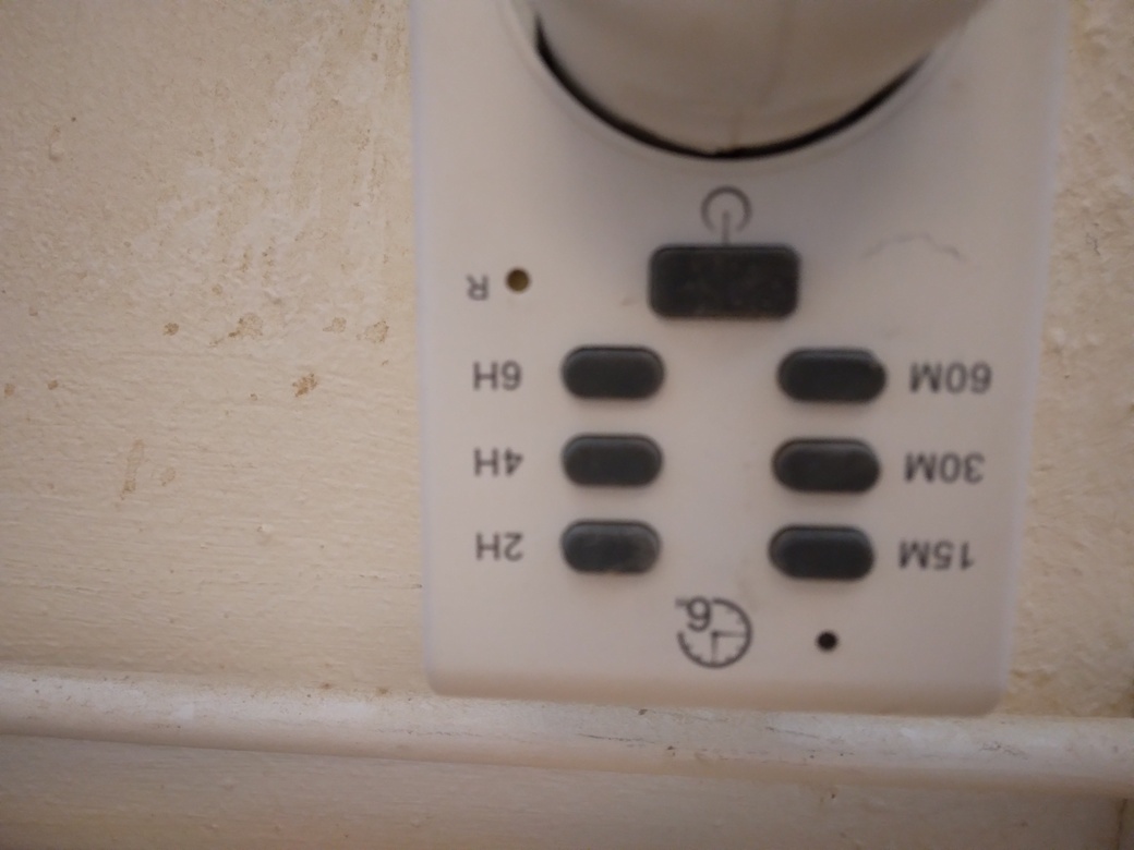 The button on the ventilation timer